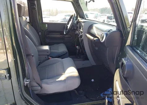 2009 Jeep Wrangler Unlimited Sahara z USA, uszkodzony, nr VIN 1J4GA59189L710032